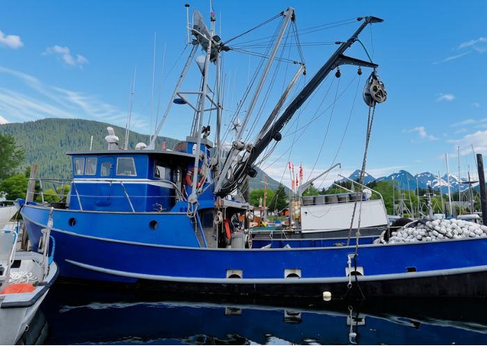 alaska fishing boat in port needing fisheries attorney and fishing industry lawyer